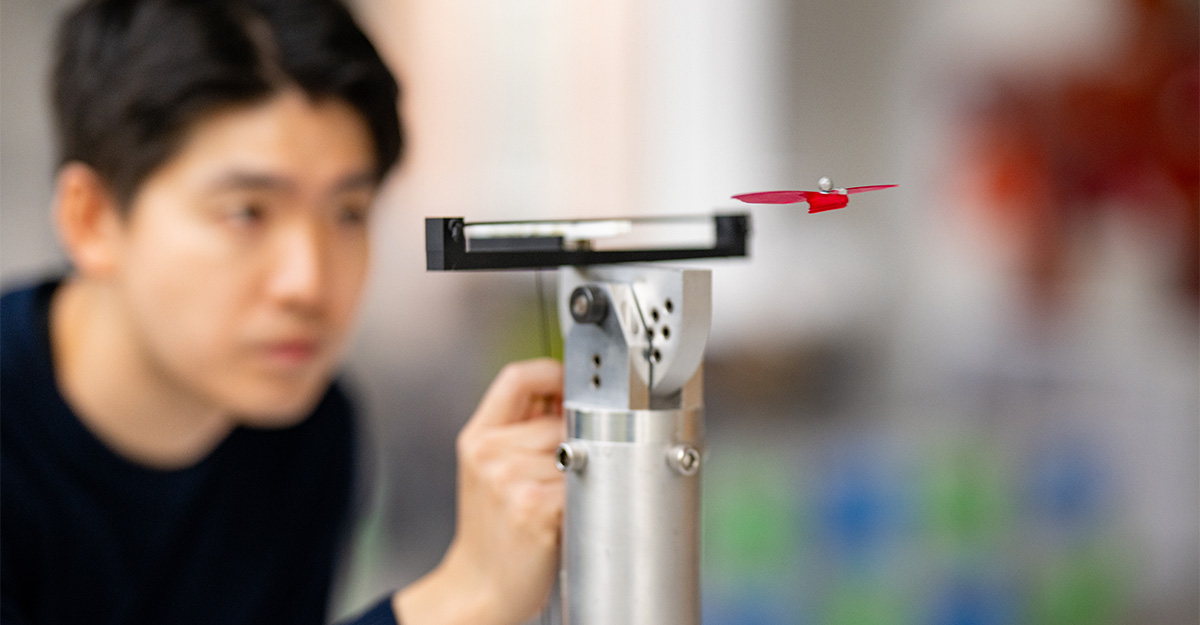 A man working with a mechanical device