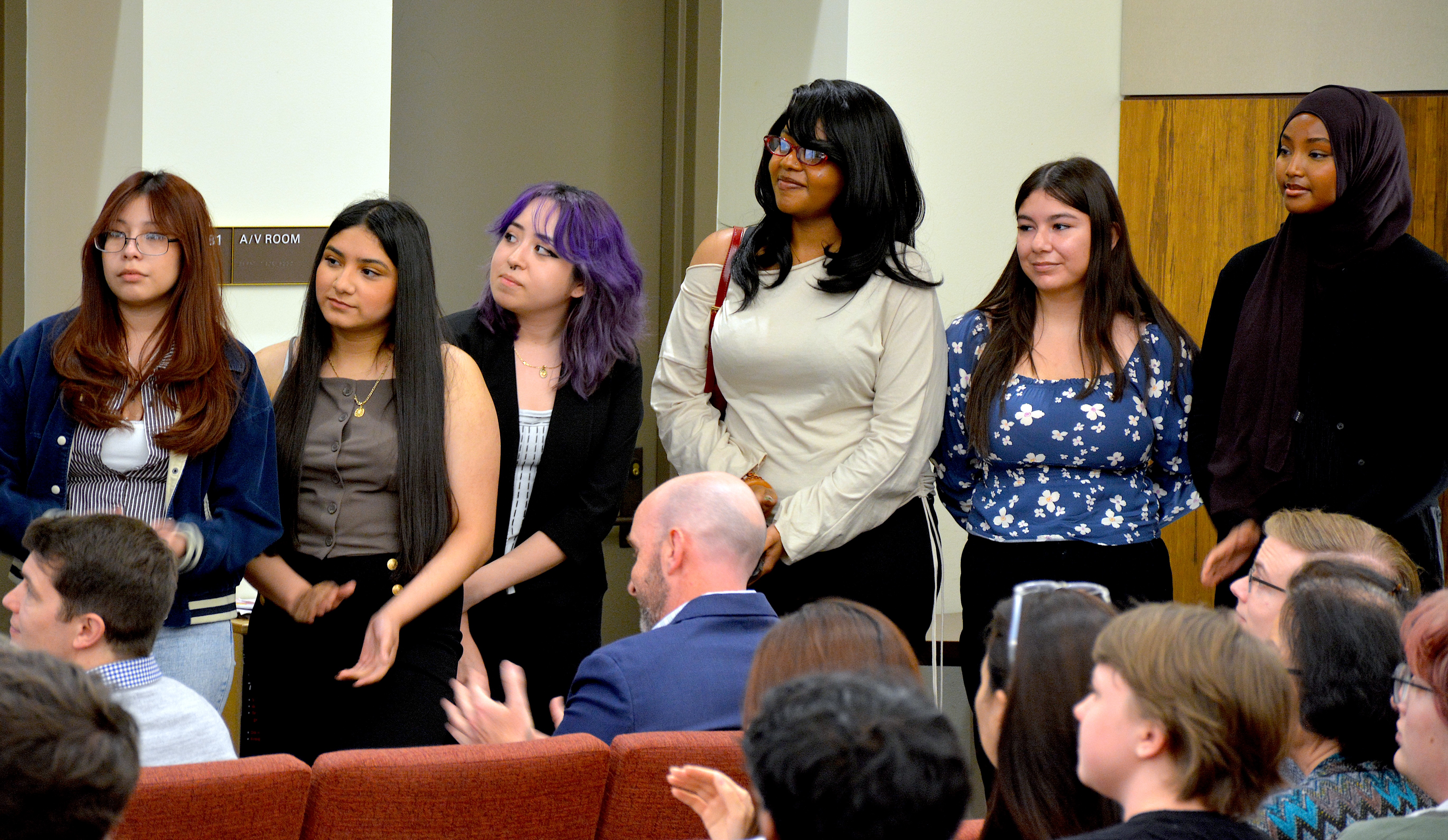 Students watching the awards presentation