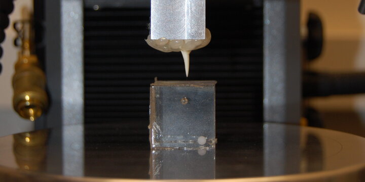 a machine simulating a puncture on skin