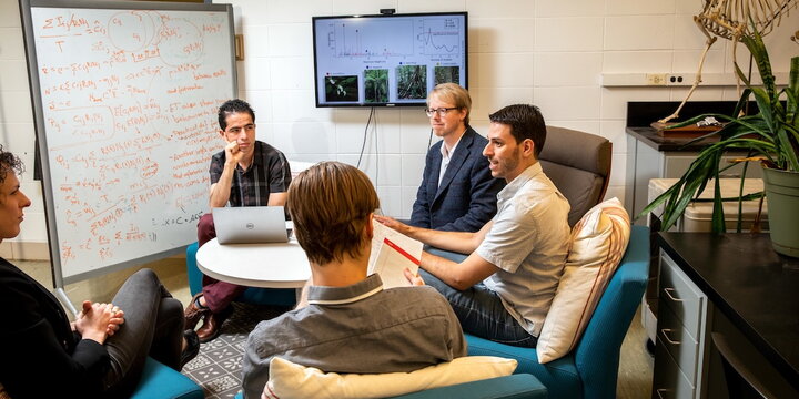 a group of people sitting and talking