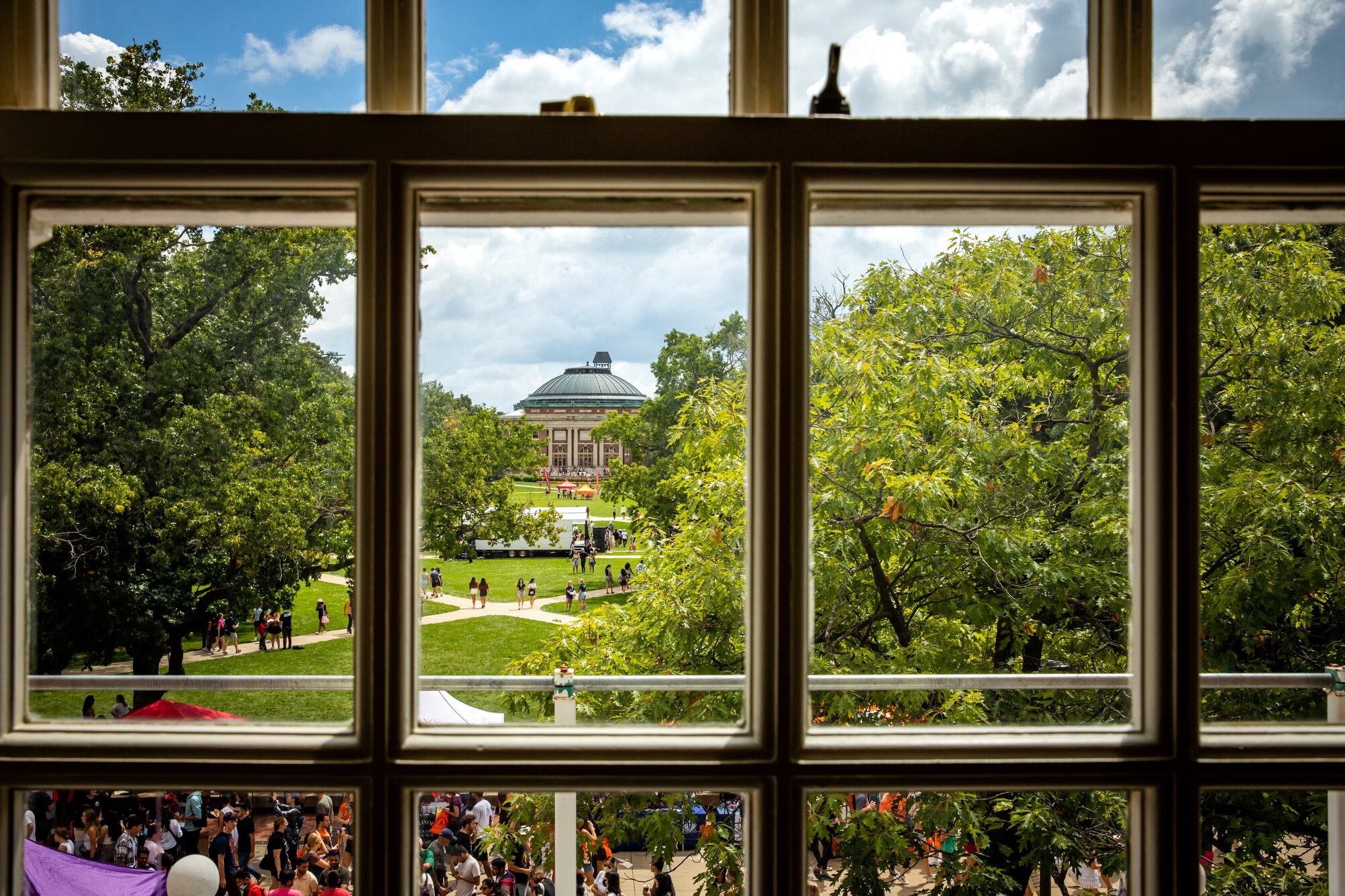 photo looking out the union windows to the quad