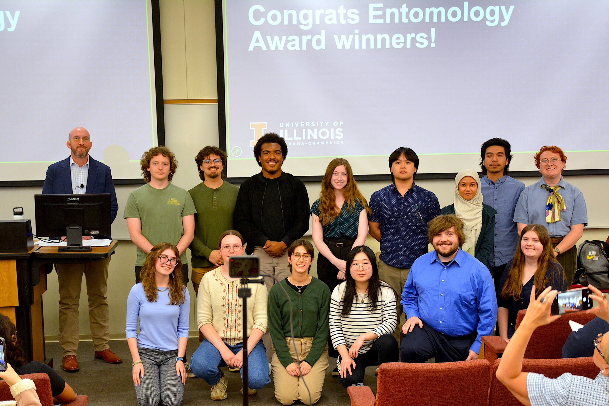 A group of students smiling at a camera 