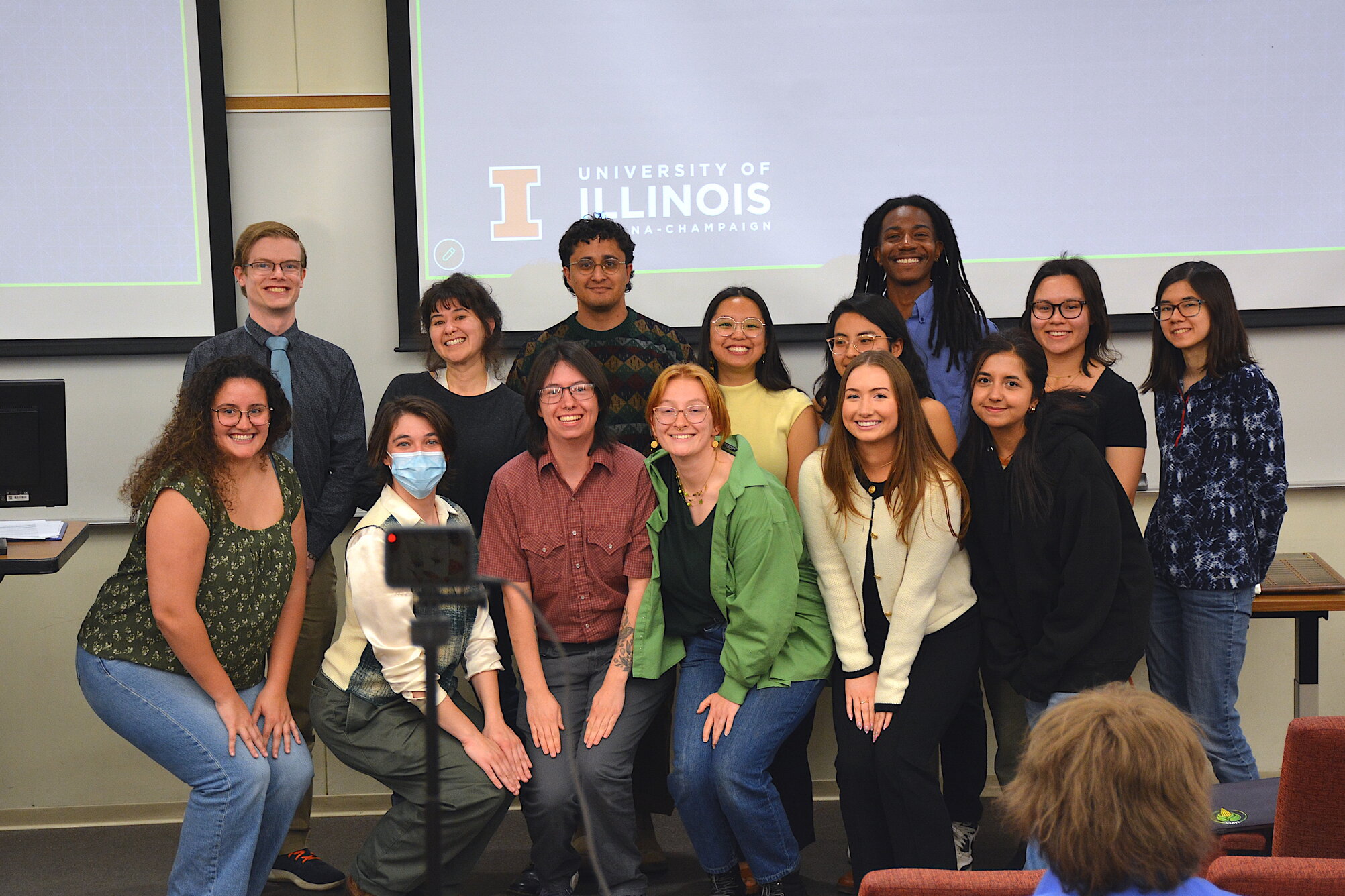 A group of students smiling at a camera