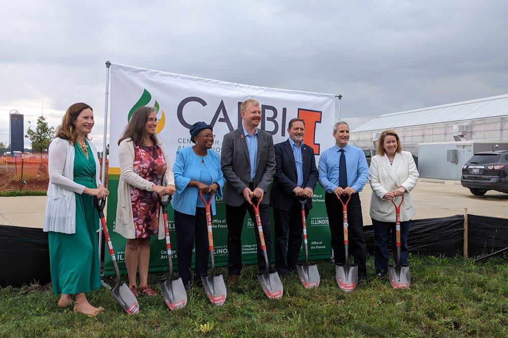 University members of leadership stand with shovels to break ground for the CABBI greenhouse