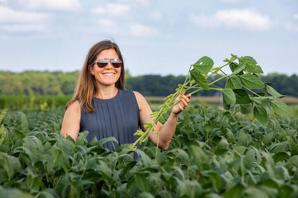 A woman standing in a field