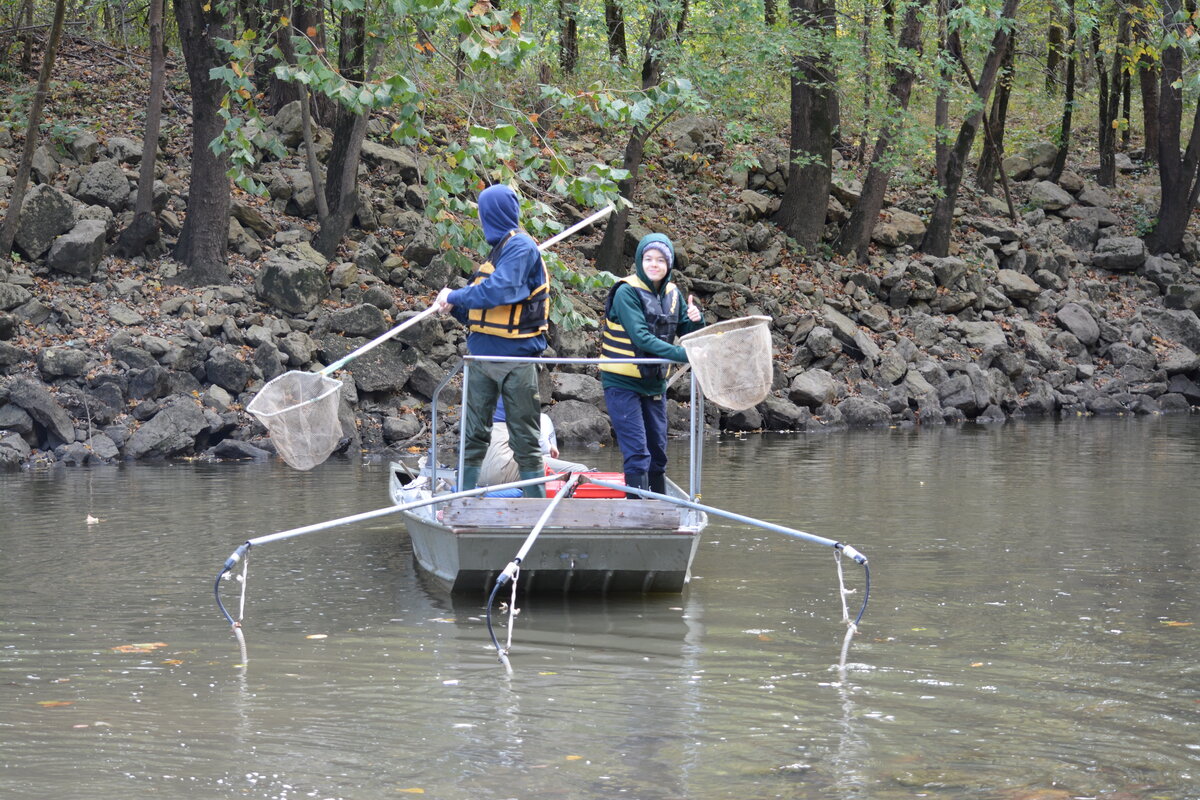 Two students on a boat