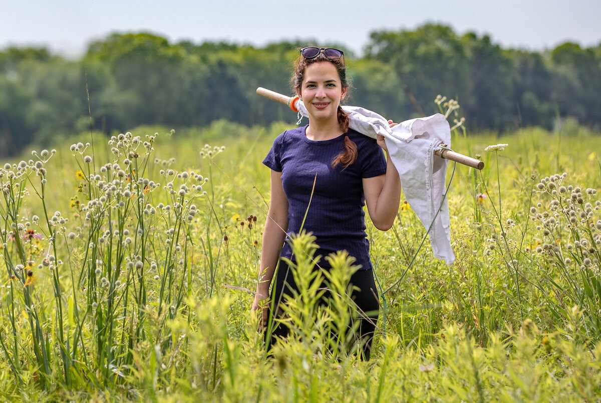  a student standing in a field