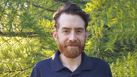 happy man in forest