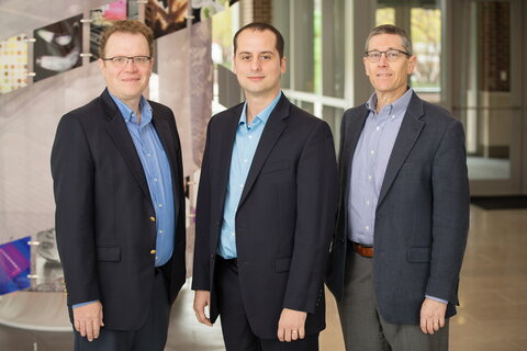 three men in suits