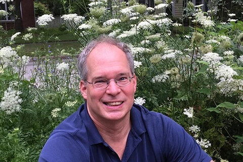 Stephen in front of queen anne's lace