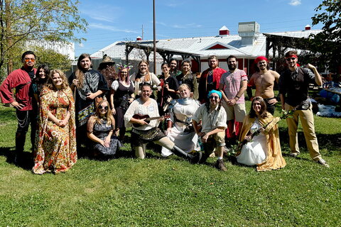 a group photo of the cosplayers