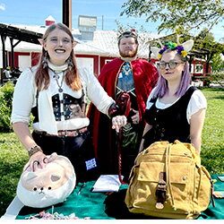 three people dressed up in cosplay