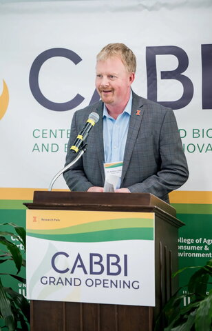 a man standing at a podium