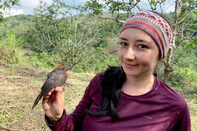 Juliana with bird in hand