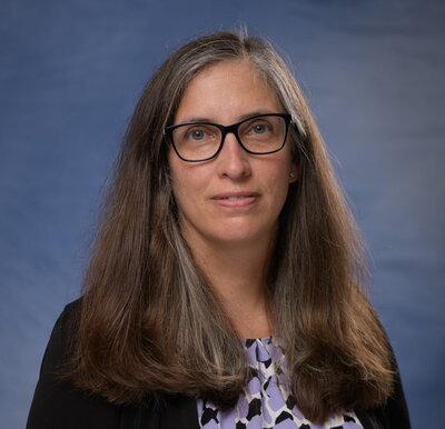 headshot of Carla Caceres