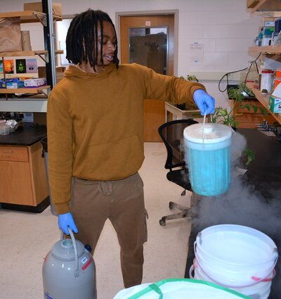 A man working with liquid nitrogen