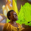 woman speaking at a podium