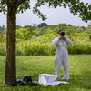 person putting on protective clothing