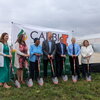 University members of leadership stand with shovels to break ground for the CABBI greenhouse