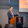 Brent Roberts speaking at a podium