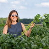 A woman standing in a field