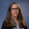 headshot of Carla Caceres