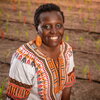 A photo of Esther standing in a field