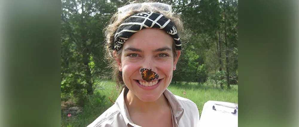a butterfly on a person's nose