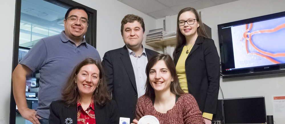 five smiling people