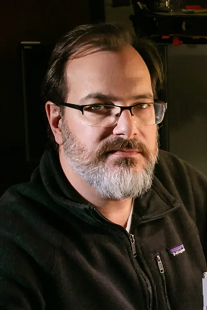 A headshot of Andy Suarez