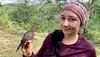 Juliana Soto, with a sooty ant tanager, Habia gutturalis