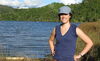 photo of woman at a lake