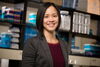 smiling woman in a lab