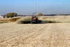 Basalt is applied to fields at the University of Illinois Energy Farm. (Photo courtesy of iSEE)