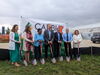 University members of leadership stand with shovels to break ground for the CABBI greenhouse