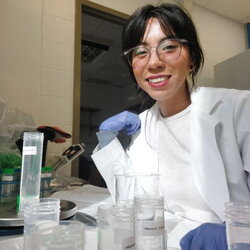 A photo of Natalie Belloso in the lab