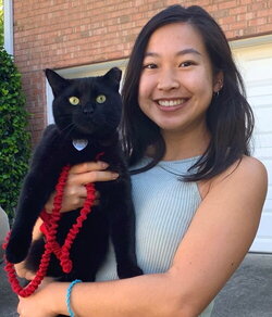 A photo of Vivian Cheng holding a cat