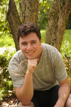 headshot of elijah becker