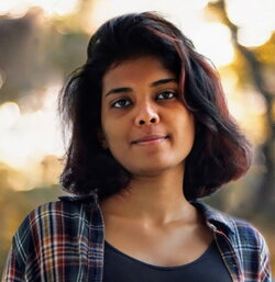 A headshot of Malavika Venu