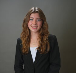 A headshot of Sophia Vodnik