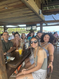 A group photo of the class out to dinner